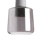 Suspension LED en métal avec base en béton et cylindre en verre